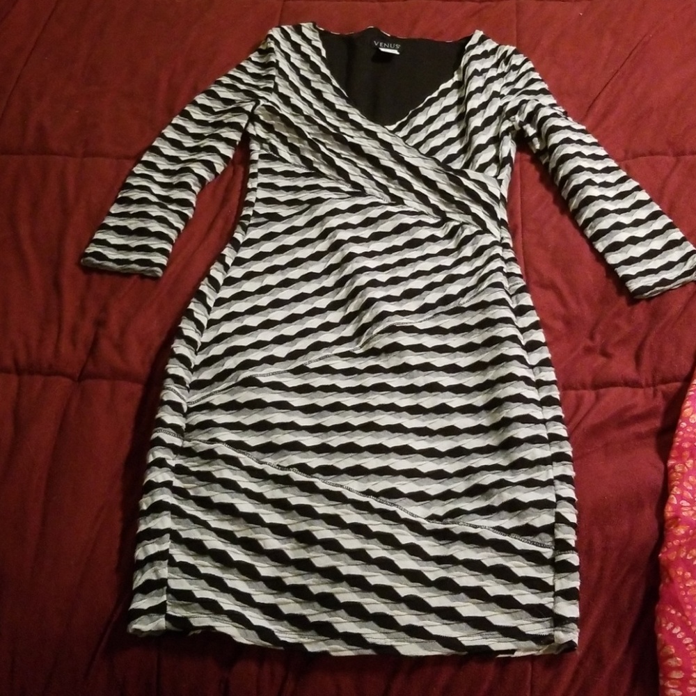 Comfy yet form flattering dress.